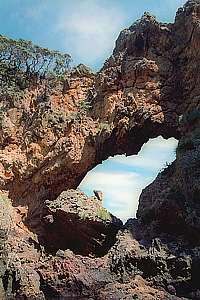 view of the natural bridge from inside Jan's Tunnel