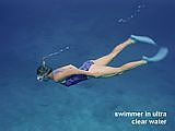 swimmer in ultra clear water