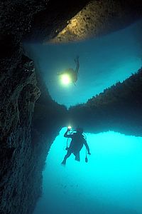 a diver enters Bernie's Cave