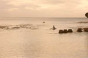 outrigger canoes out fishing
