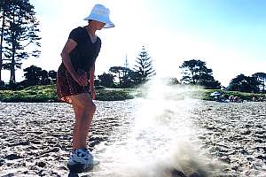 f212031: kicking the sand to see pollution